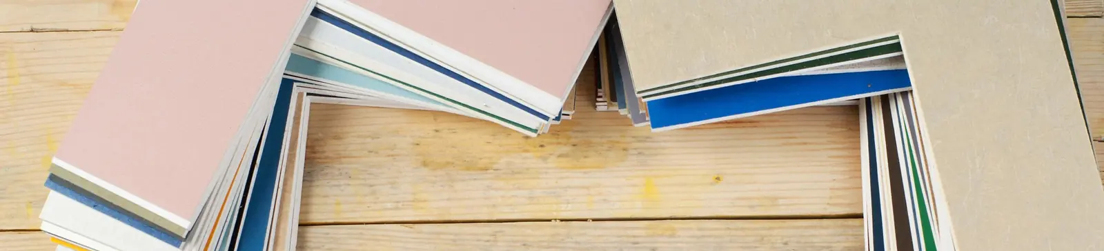 Fan of mount board samples in pastel and neutral colours